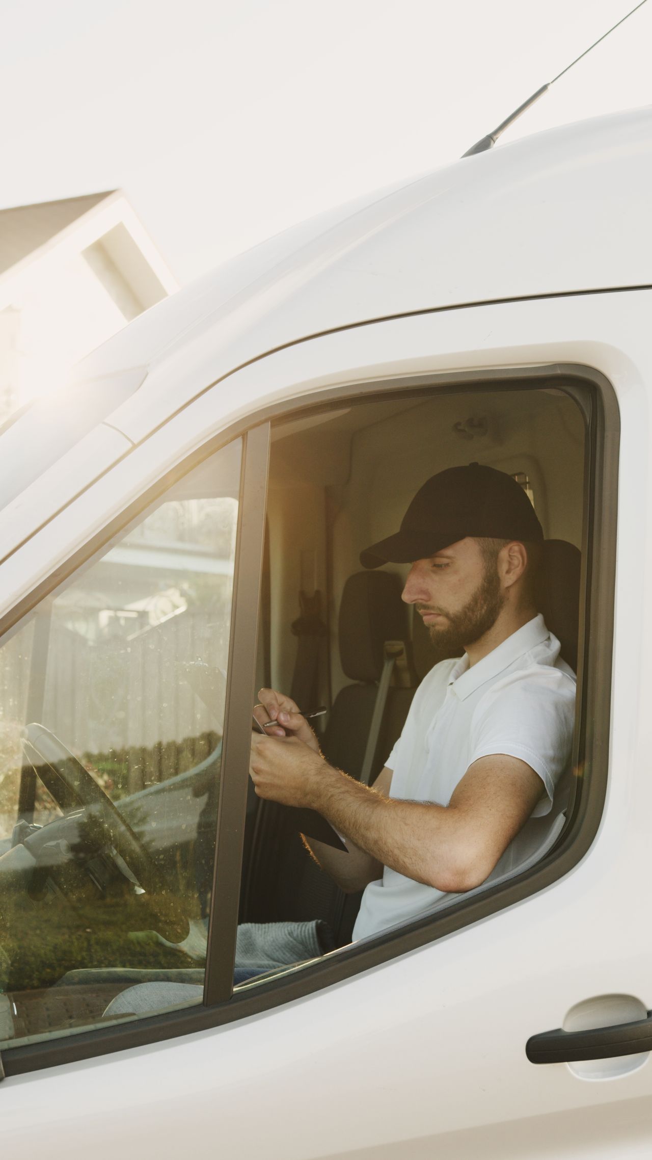  fleet driver reviewing route information on a dashboard-mounted rugged device